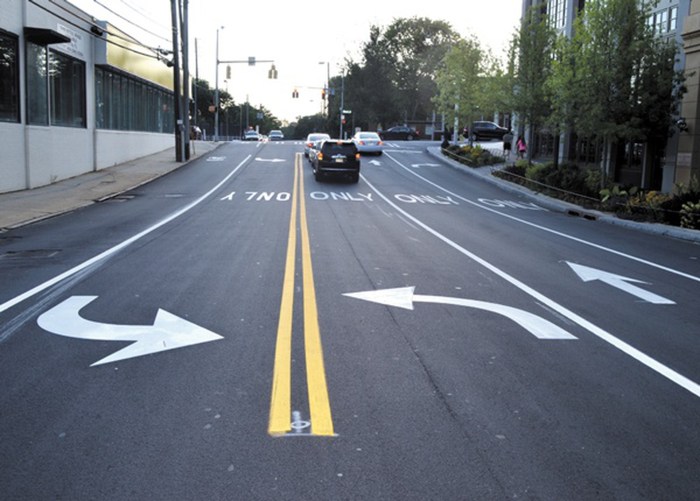 Lanes of traffic going in opposite directions are divided by